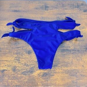 Aila Blue double adjustable side tie cutout blue bikini swim bottom, large.